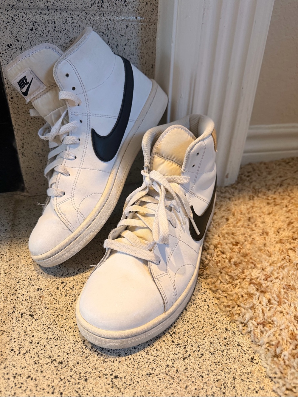 Nike Men’s White High-Top Sneakers with Black Swoosh Accent